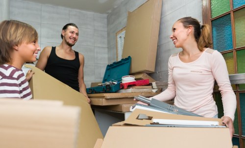 Home removal team planning a move in a Catford residential street