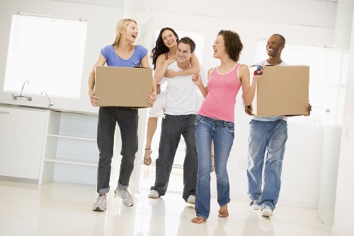 Furniture removals team loading household items in Catford