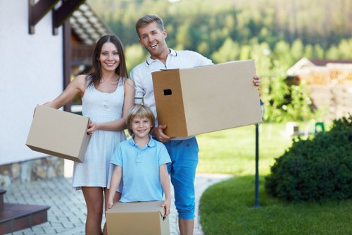 Careful loading of desks and business furniture for relocation