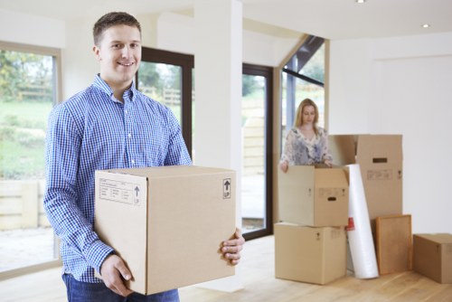Careful packing of fragile belongings by a local removals team
