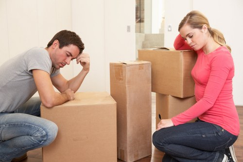 Trained movers handling furniture with care during a Catford removal van job